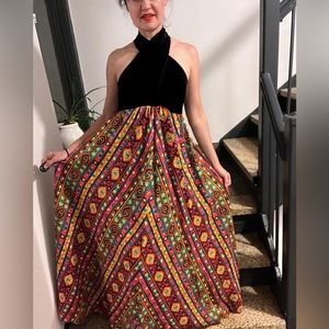 Vintage goddess dress with back velvet crisscross bodice and bright skirt. Small
